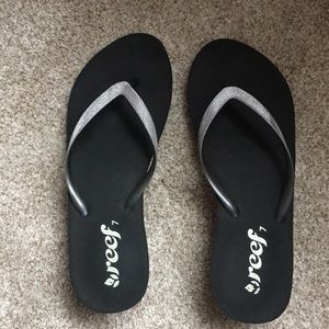 Reef silver sparkle and black flip flops